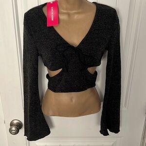 Women’s cut out long sleeve shirt.